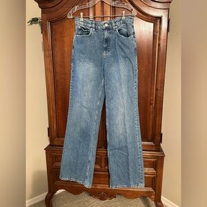 Free people high rise bootleg jeans.  Size 27